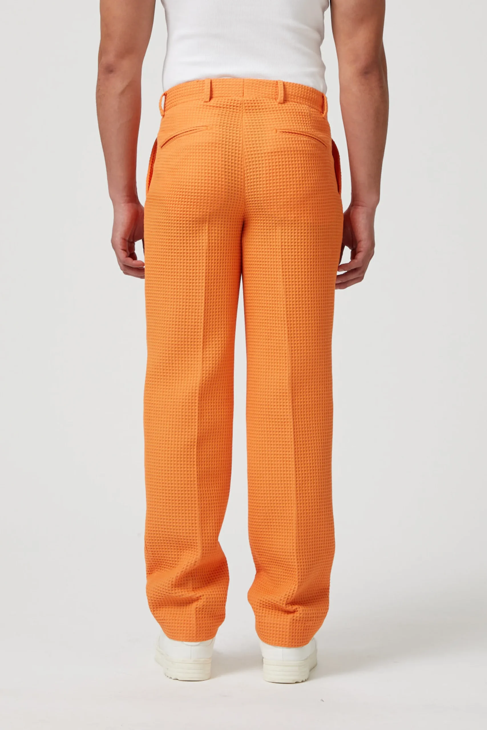 Twisted Tailor Gaufre Orange Waffle Knit Cotton Trousers | Unisex
