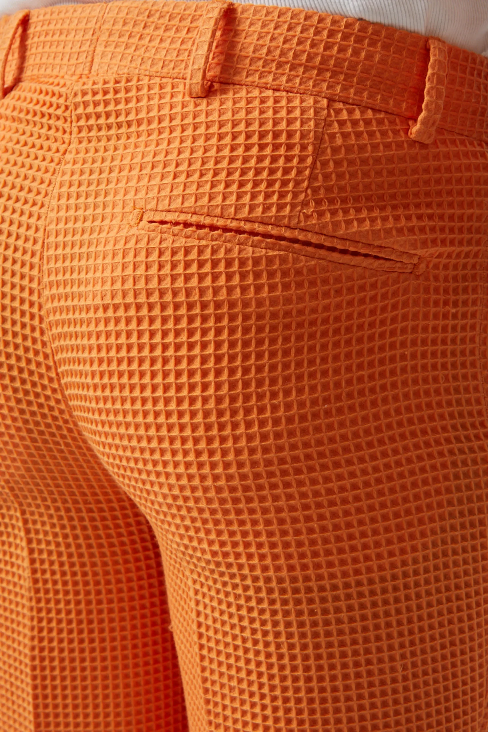 Twisted Tailor Gaufre Orange Waffle Knit Cotton Trousers | Unisex