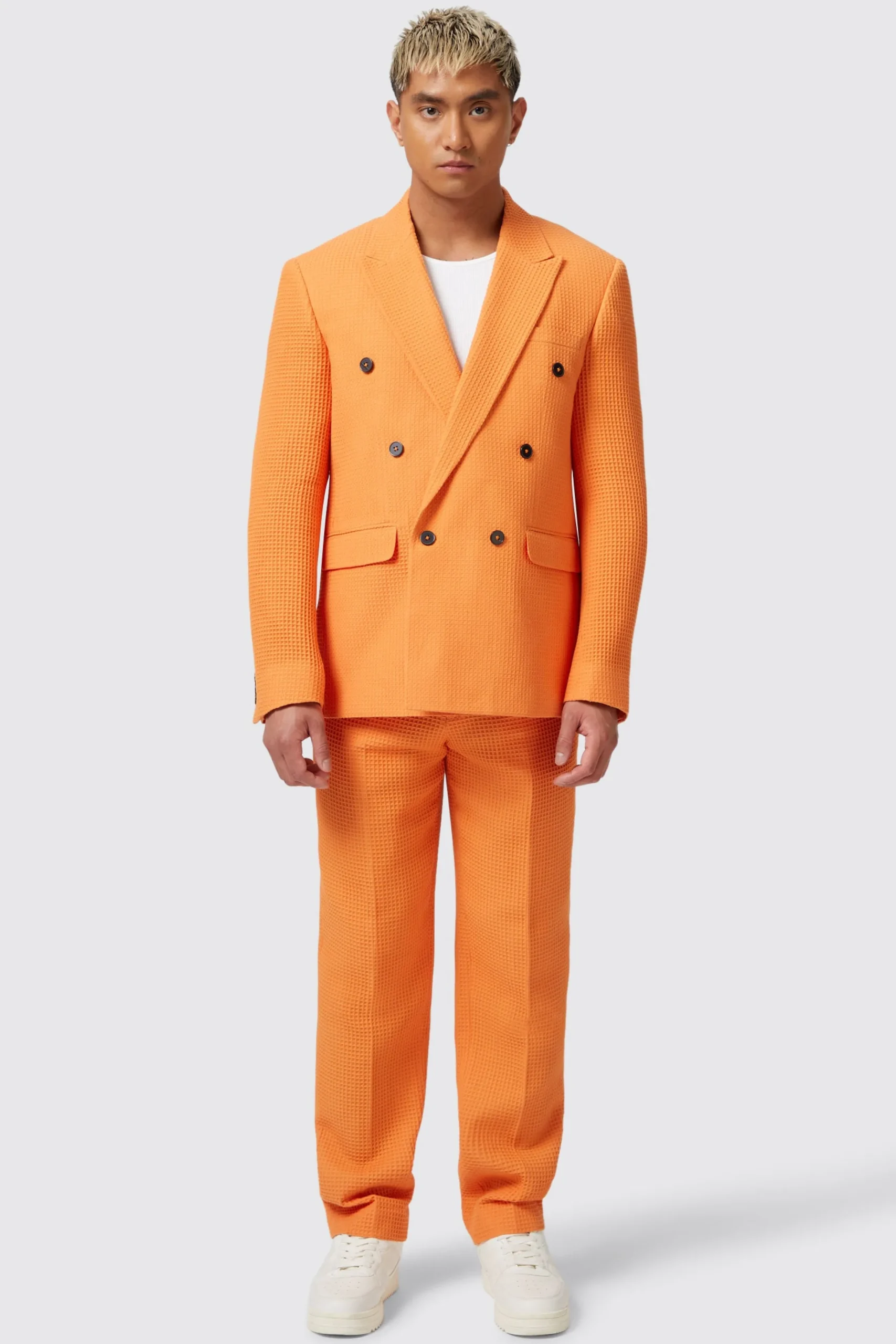 Twisted Tailor Gaufre Orange Waffle Knit Cotton Trousers | Unisex